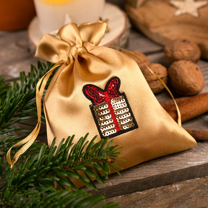 Zlatý saténový dárkový sáček